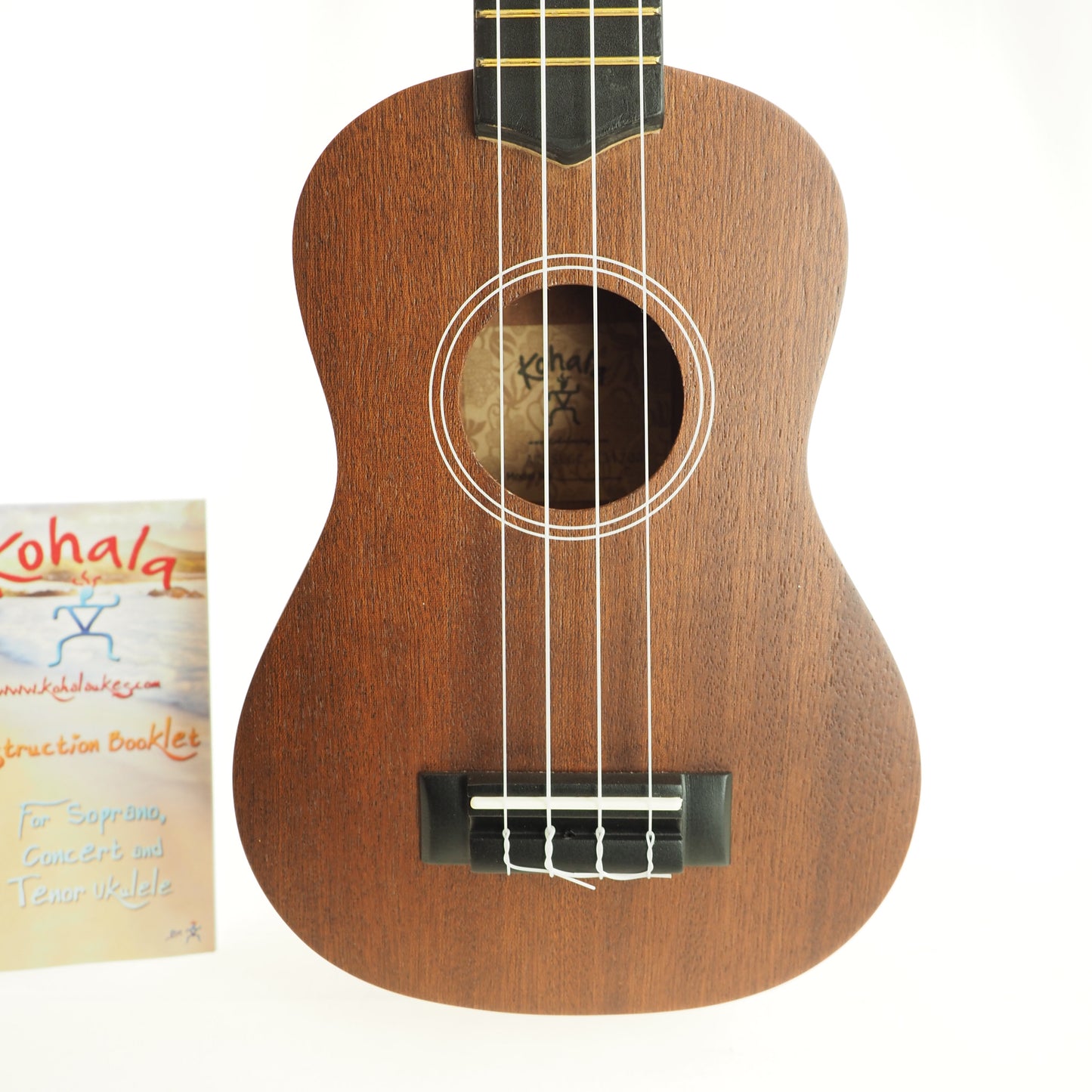Kohala AK-SLGC Soprano ukulele with chord book, tunes up and plays in tune, nice sounding.