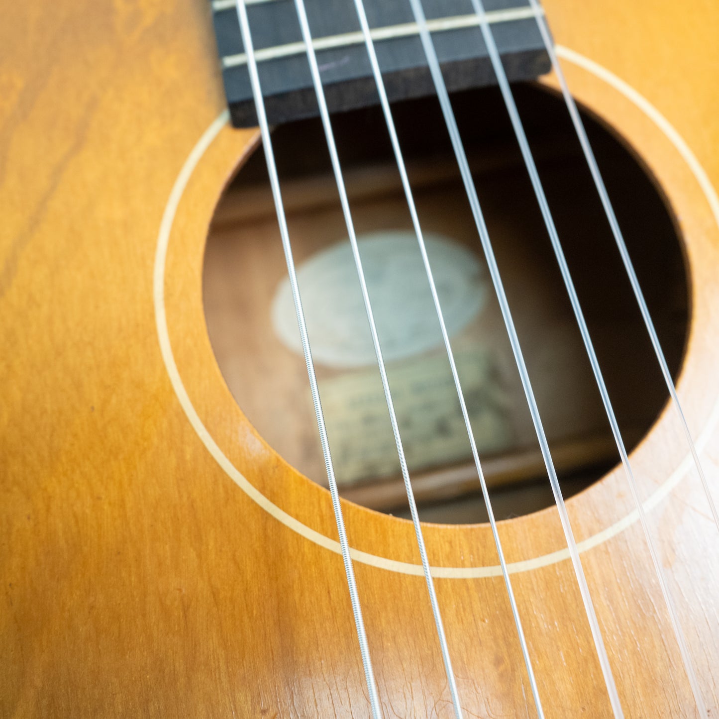 Harmony ? classical acoustic guitar, natural top, reglued bridge.