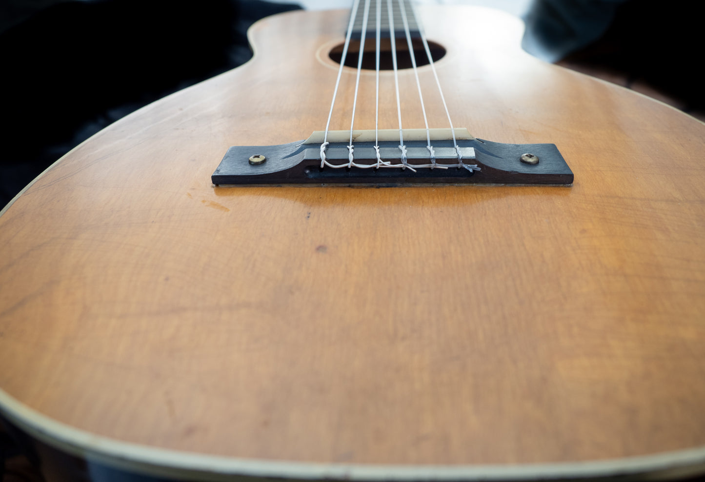 Harmony ? classical acoustic guitar, natural top, reglued bridge.