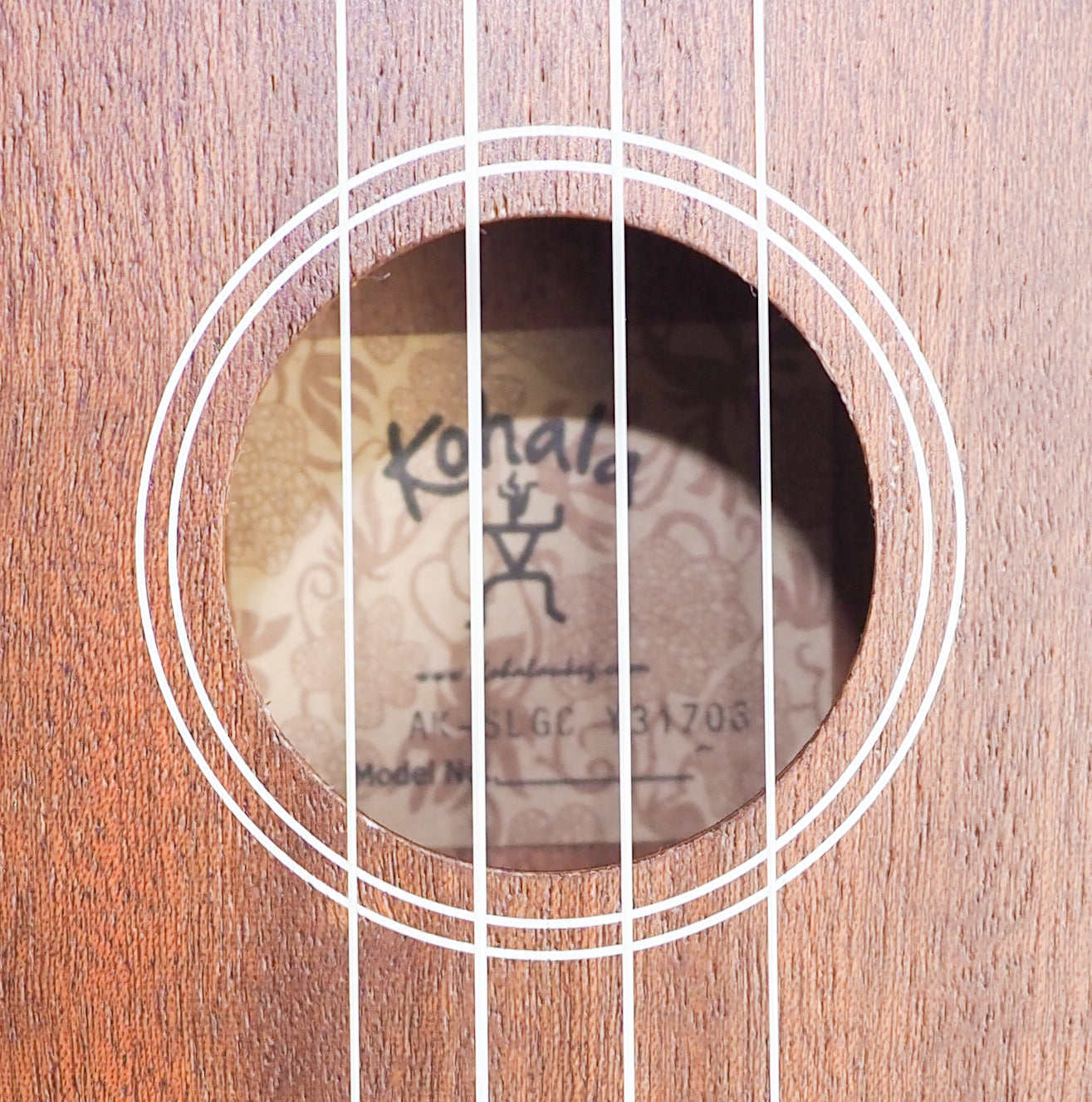 Kohala AK-SLGC Soprano ukulele with chord book, tunes up and plays in tune, nice sounding.